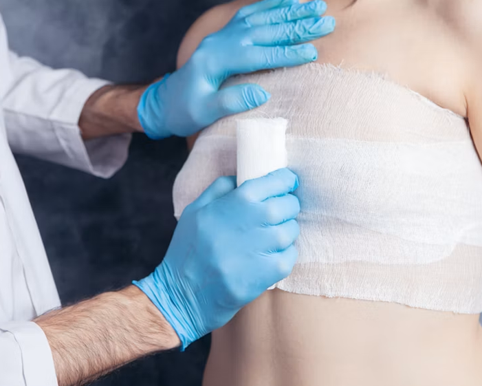 Surgeon consulting a patient about Breast Reduction